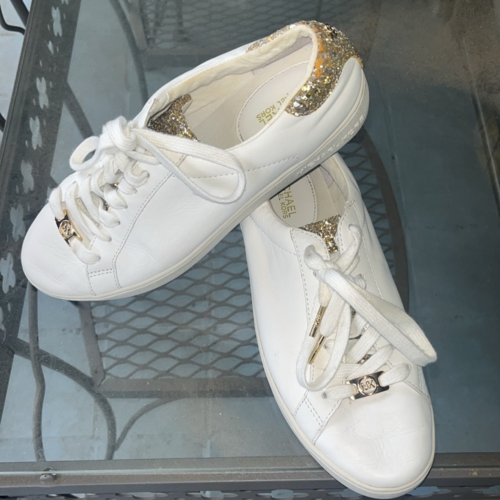 Women's Michael Kores flat trainers with gold glitter